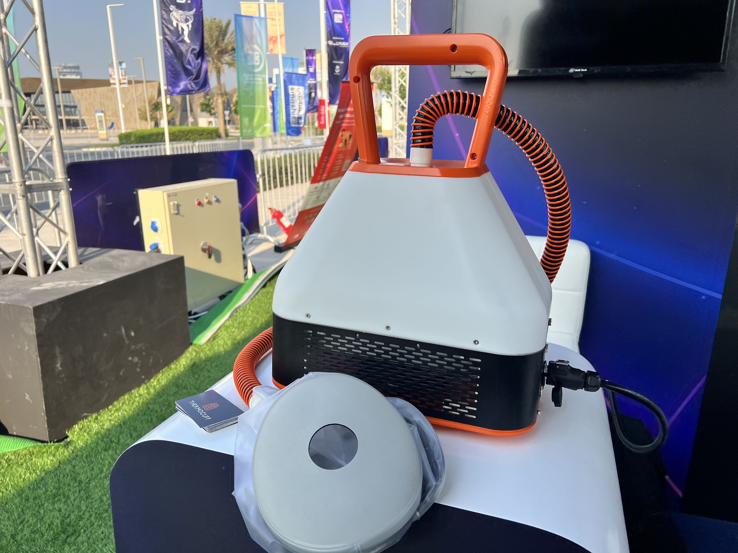 ThermoCuff console and cuff on a demo table at an outdoor event